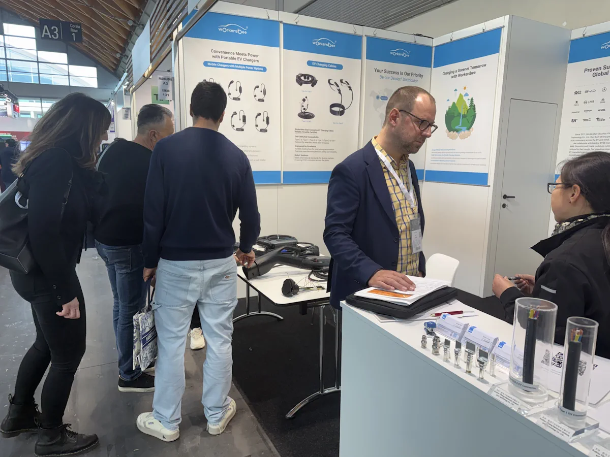 Visitors discussing EV charging products with the Workersbee team at KEY Expo 2026